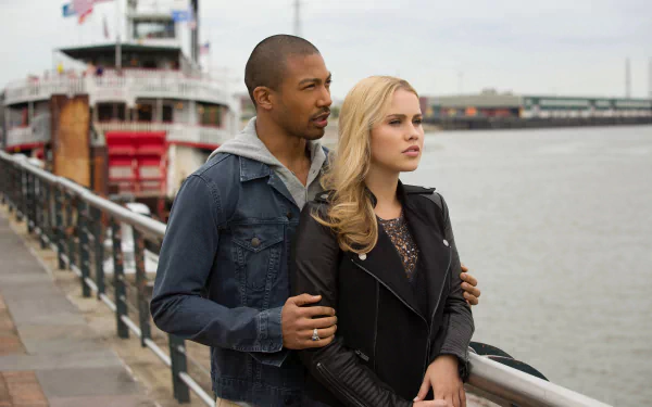 4K Ultra HD desktop wallpaper featuring a scene from the TV show The Originals with two characters standing by a waterfront railing.