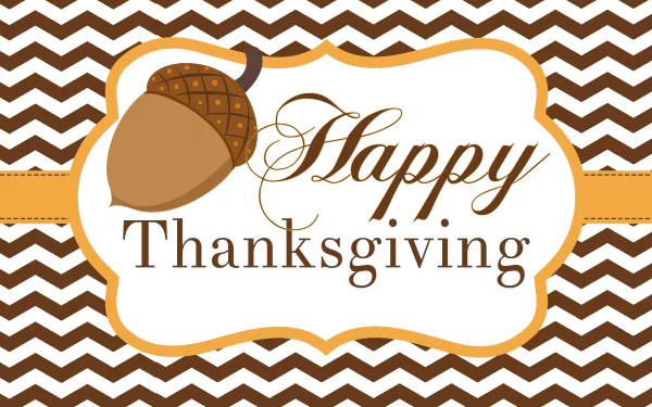 HD desktop wallpaper featuring a brown and white chevron background with an acorn and the elegant text Happy Thanksgiving celebrating the holiday.