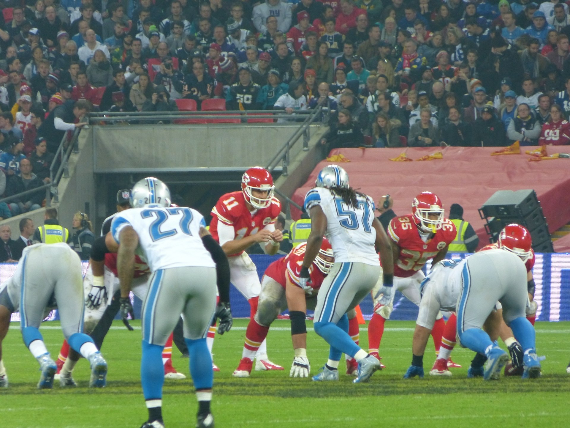Kansas City Chiefs in action against the Detroit Lions during an intense NFL game, captured in 4K Ultra HD as a dynamic PC desktop wallpaper.