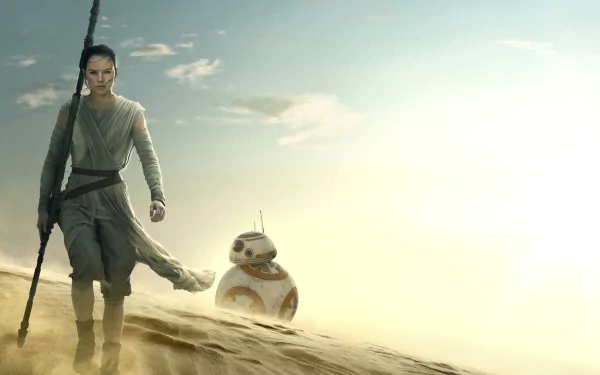 HD desktop wallpaper of Rey and BB-8 from Star Wars Episode VII: The Force Awakens, with Rey portrayed by Daisy Ridley, walking in a sunlit desert landscape.