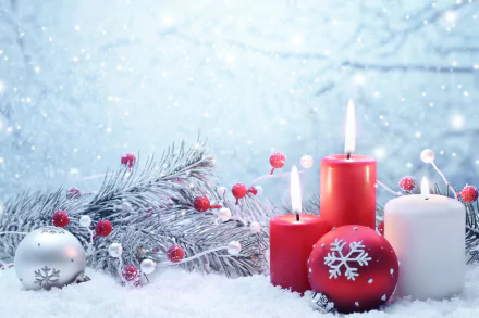 A serene winter scene featuring red and white candles surrounded by festive Christmas ornaments, with a snowy background and gentle snowfall, creating a cozy holiday atmosphere.