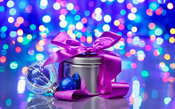 A festive Christmas scene featuring a decorated gift tin with a purple ribbon, surrounded by colorful bokeh lights and sparkling ornaments, creating a joyful holiday atmosphere.