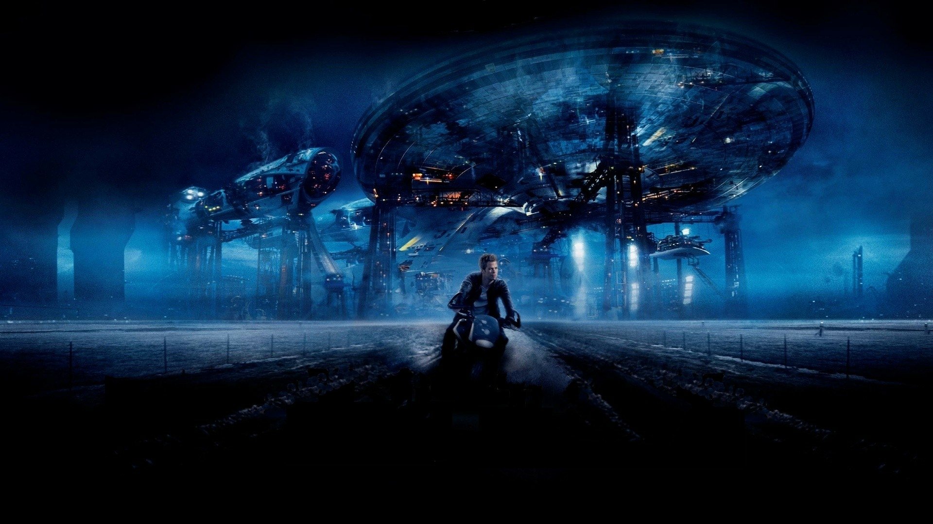 HD PC desktop wallpaper featuring a dramatic scene from the Star Trek movie with a character in the foreground and futuristic spacecraft structures in the background.