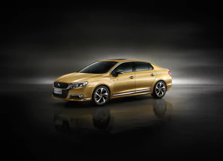 HD desktop wallpaper featuring a sleek gold Citroën DS5 car in a reflective studio setting, showcasing the vehicle's modern design and elegance.