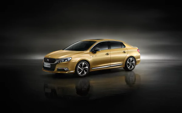 HD desktop wallpaper featuring a sleek gold Citroën DS5 car in a reflective studio setting, showcasing the vehicle's modern design and elegance.