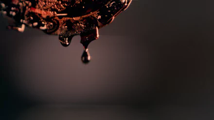 Close-up shot of a blood-dripping weapon from the TV show Ash vs. Evil Dead, featured as an HD PC desktop wallpaper and background.