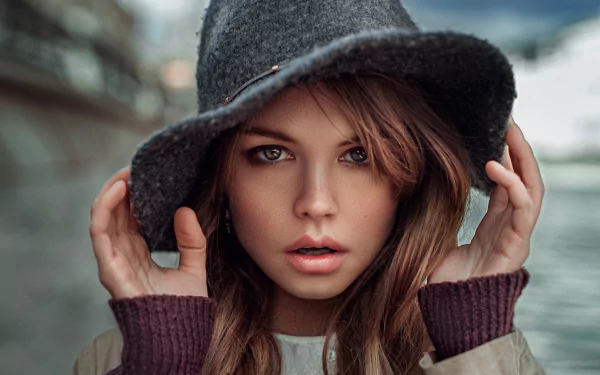 A brunette woman with green eyes, wearing a hat, is featured in this HD desktop wallpaper with a bokeh background. The image is tagged with Anastasiya Scheglova.