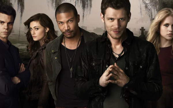 HD desktop wallpaper featuring characters from the TV show The Originals, set against a dark, atmospheric background with a graveyard theme.