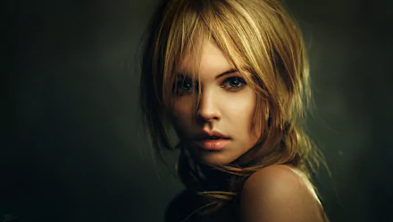 HD desktop wallpaper featuring model Anastasiya Scheglova, a brunette woman with green eyes, posed against a dark background.
