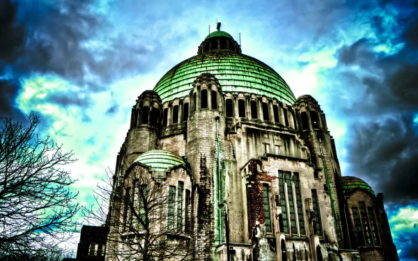 HDR 4K Ultra HD PC desktop wallpaper of a dramatic religious Gothic church with green-tinted dome, towering stone facade and stormy sky.