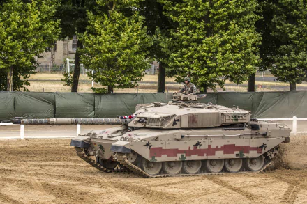 Challenger 1 tank in a military exercise on a parade ground, desert camouflage, 5K Ultra HD PC desktop wallpaper and background.