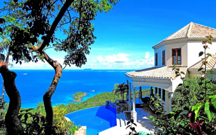 A stunning tropical island scene featuring a luxurious house overlooking a sparkling ocean, complemented by a beautiful man-made pool, perfect for a serene vacation backdrop.