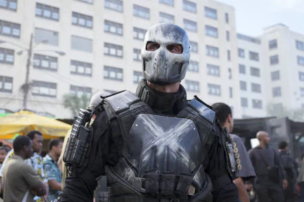 A striking HD desktop wallpaper featuring Crossbones from Marvel Comics in Captain America: Civil War, showcasing his menacing presence amidst an urban backdrop.