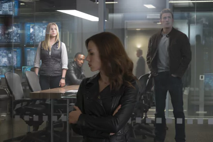 A dynamic scene from Captain America: Civil War, featuring Chris Evans as Captain America, Scarlett Johansson as Black Widow, Anthony Mackie as Falcon, and Emily VanCamp as Agent 13 in a tense moment.