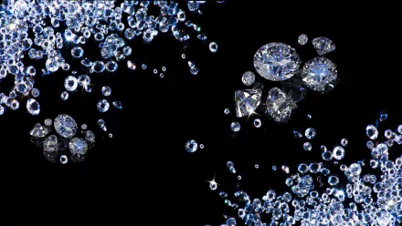 HD desktop wallpaper featuring sparkling diamonds scattered against a black background, showcasing the beauty of nature.