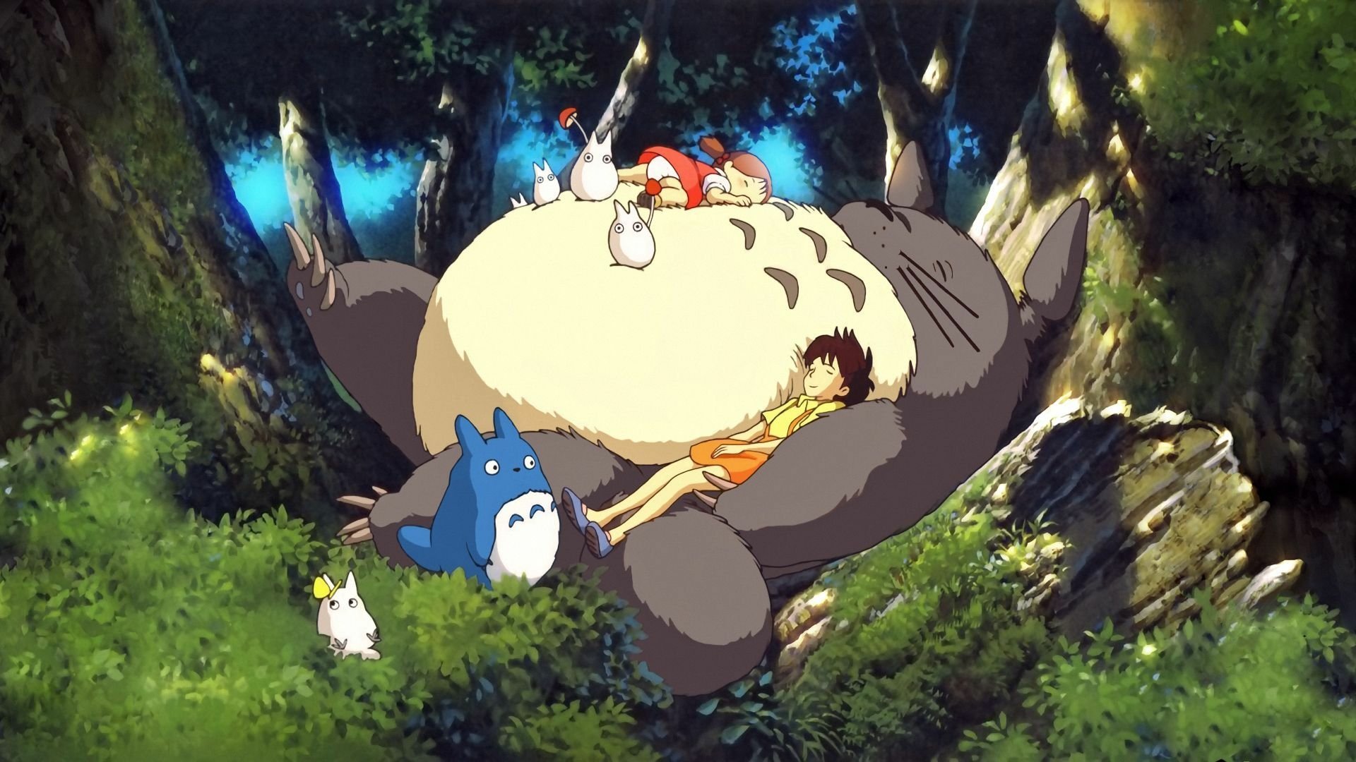 HD wallpaper of Totoro with Satsuki and Mei from 'My Neighbor Totoro' in an enchanting forest setting.