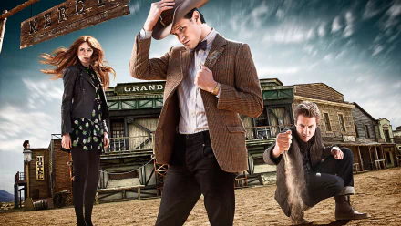 HD desktop wallpaper featuring Matt Smith as the Doctor, Karen Gillan as Amy Pond, and a western town backdrop from the TV show Doctor Who (2005).