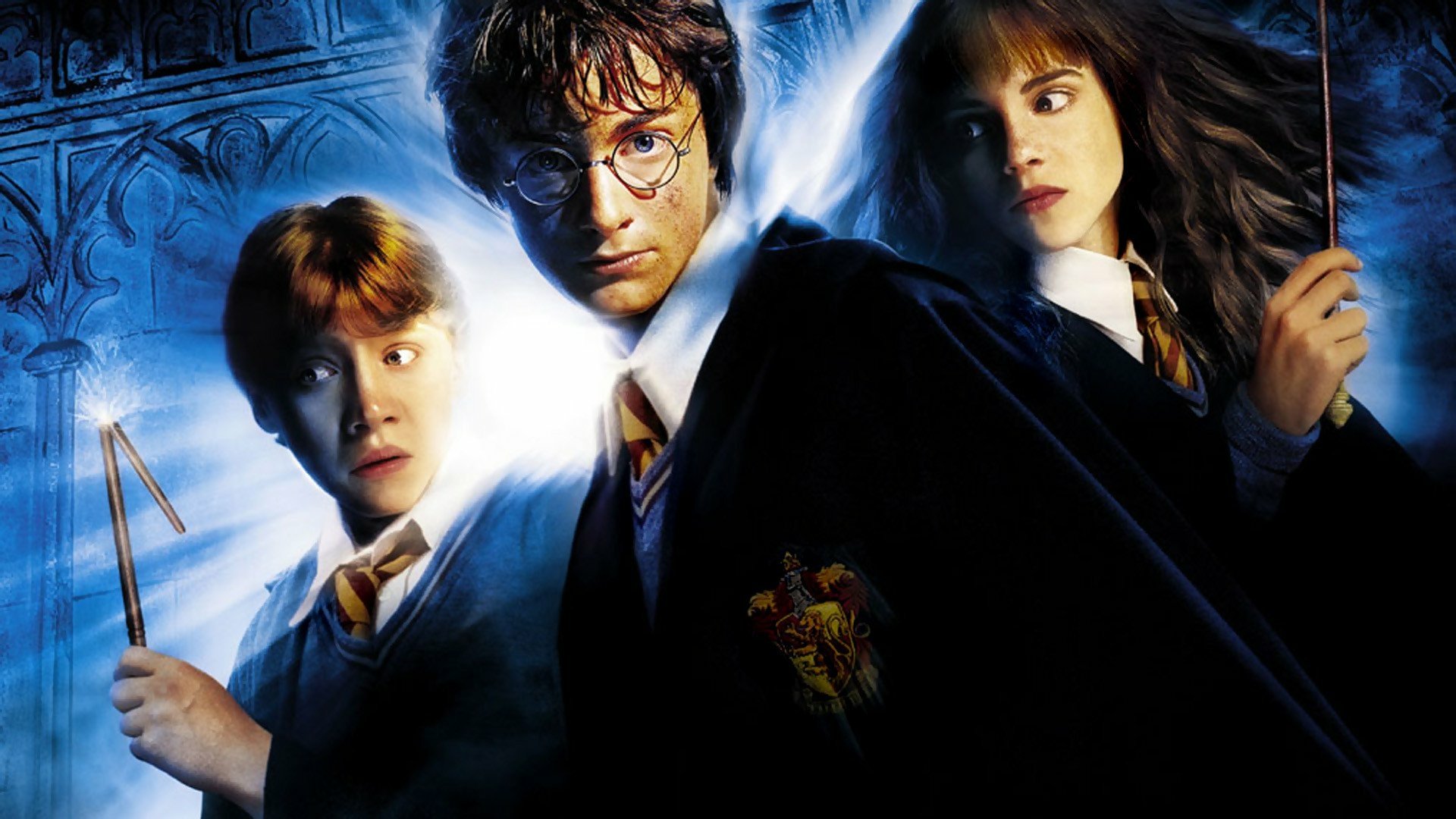 HD wallpaper featuring characters from Harry Potter and the Chamber of Secrets, showcasing Harry, Ron, and Hermione with wands, set against a magical background.