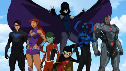 A vibrant HD wallpaper featuring DC Comics characters: Nightwing, Starfire, Beast Boy, Robin, Raven, Blue Beetle, and Cyborg from the movie Justice League vs. Teen Titans.