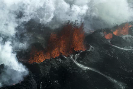 Bárðarbunga volcano eruption in Iceland with glowing lava and thick smoke captured in 4K Ultra HD.
