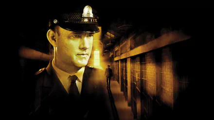 A HD wallpaper featuring a scene from the movie The Green Mile, showcasing Tom Hanks in a jail setting, with dramatic lighting and an atmospheric prison background.