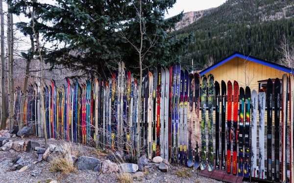  Skis on a fence in Idaho Springs Colorado by 12019