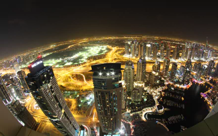 Fisheye lens view of a vibrant cityscape at night, serving as a dynamic HD desktop wallpaper and background.