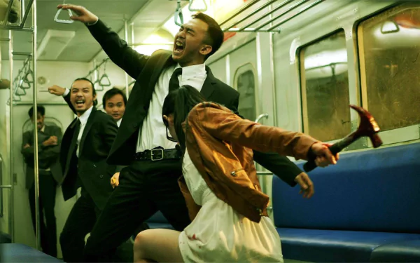 HD PC desktop wallpaper featuring an intense fight scene from the movie The Raid 2 inside a subway train.