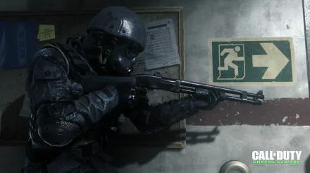 Call of Duty: Modern Warfare Remastered video game 2K Quad HD PC desktop wallpaper — armored soldier in tactical gear aiming a shotgun in a dim corridor beneath an exit sign.