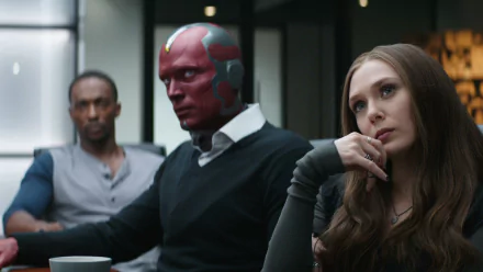A dramatic scene featuring Scarlet Witch (Elizabeth Olsen) and Vision (Paul Bettany) in Captain America: Civil War, with a tense atmosphere and vivid character expressions.