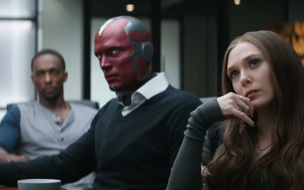 A dramatic scene featuring Scarlet Witch (Elizabeth Olsen) and Vision (Paul Bettany) in Captain America: Civil War, with a tense atmosphere and vivid character expressions.