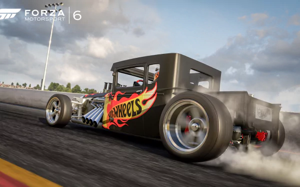 Video game HD PC desktop wallpaper and background, Forza Motorsport 6: black hot rod with a flame decal drifting on a racetrack, rear tires smoking beneath a cloudy sky.