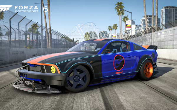 HD PC desktop wallpaper featuring a Ford race car from the video game Forza Motorsport 6, set on a sunlit racetrack with palm trees and cityscape in the background.