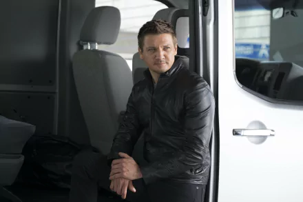Clint Barton, portrayed by Jeremy Renner, sits pensively in a van, showcasing his character from Captain America: Civil War in this HD desktop wallpaper.
