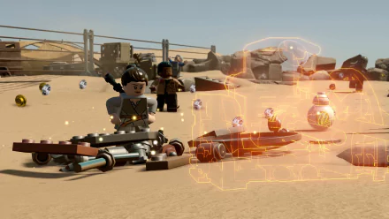 HD desktop wallpaper from LEGO Star Wars: The Force Awakens featuring LEGO characters and vehicles on a sandy backdrop.