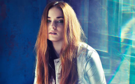 A stunning HD desktop wallpaper featuring celebrity Sophie Turner, showcasing her striking features and long, flowing hair against a vibrant, colorful backdrop.