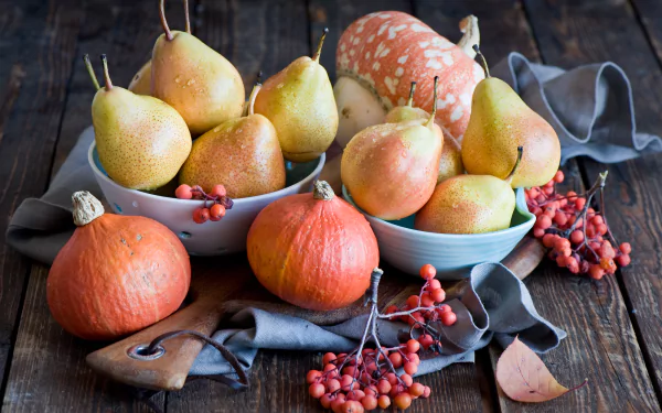 HD PC desktop wallpaper still life of pears, small pumpkins and red berries on a rustic table — fruit, food, and Fruits & Vegetables background.