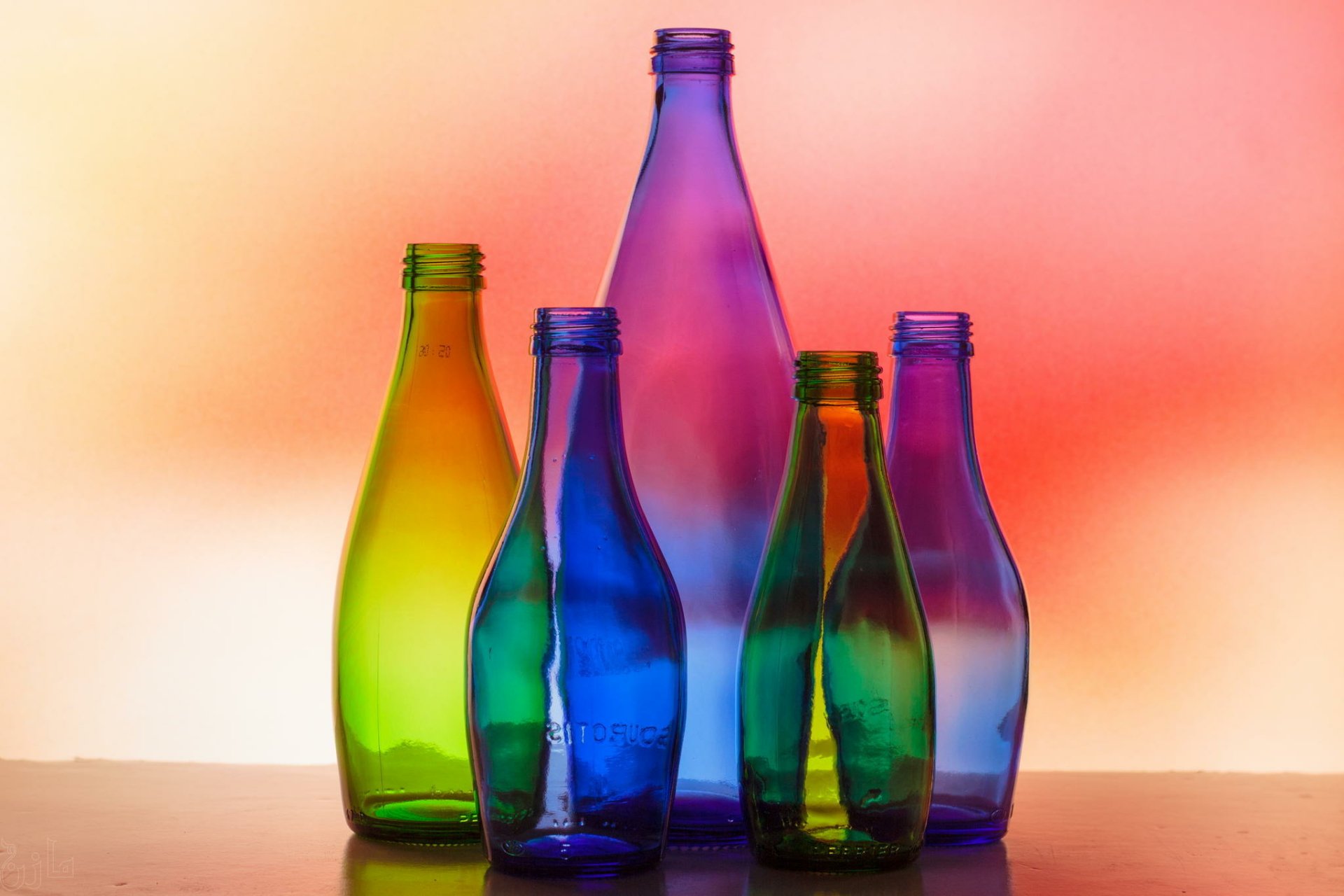 Colored Glass Bottles As A Living Room Decoration