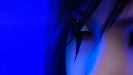 Close-up of Faith Connors' eye with blue lighting, from the video game Mirror's Edge Catalyst, shown as an HD PC desktop wallpaper and background.