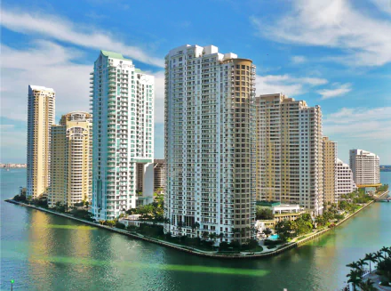 HD desktop wallpaper of Miami's iconic skyscrapers and modern architecture along the waterfront in Florida, showcasing the city's vibrant urban skyline.