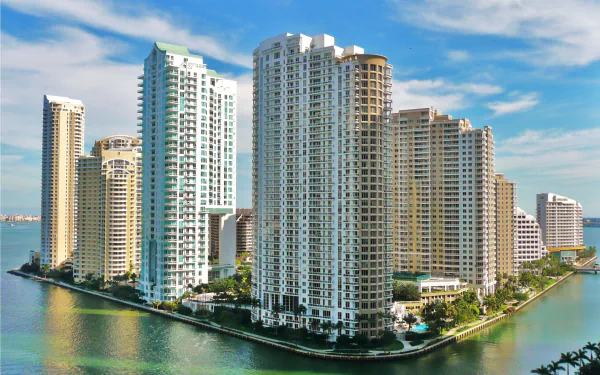 HD desktop wallpaper of Miami's iconic skyscrapers and modern architecture along the waterfront in Florida, showcasing the city's vibrant urban skyline.