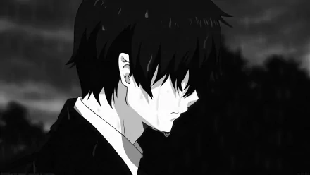 A close-up of Rin Okumura from Ao No Exorcist, depicting his black hair and a sad expression in the rain, capturing the emotive tone of this anime series. HD wallpaper quality.