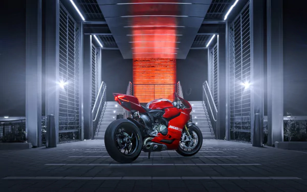 HD desktop wallpaper featuring a red Ducati 1199 Panigale motorcycle in a futuristic MotoGP-inspired setting.