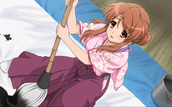 HD PC wallpaper of Mikuru Asahina from The Melancholy of Haruhi Suzumiya — anime scene of her kneeling on a bed with a mop, wearing a pink kimono and a surprised expression.