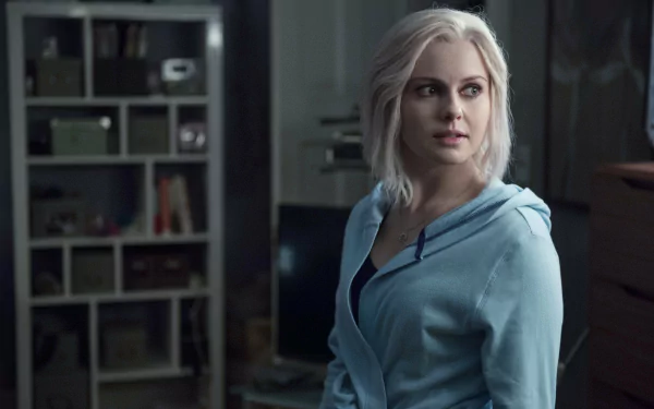 HD desktop wallpaper featuring Rose McIver from the TV show iZombie, showcasing her in a thoughtful pose with a dimly lit background.