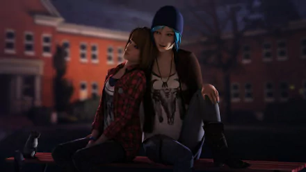 Chloe Price and Max Caulfield from the video game Life Is Strange share a close moment in this HD desktop wallpaper, set against a softly lit campus backdrop.
