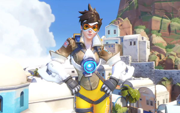 Tracer from Overwatch stands confidently in a vibrant, scenic background, showcasing her dynamic character in this 4K Ultra HD PC desktop wallpaper.