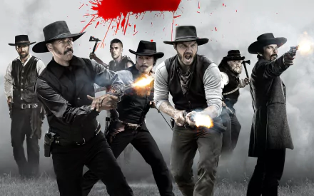 A dramatic scene from The Magnificent Seven (2016), featuring actors Martin Sensmeier, Manuel Rulfo, Lee Byung-hun, Ethan Hawke, Chris Pratt, and Denzel Washington in a western showdown.