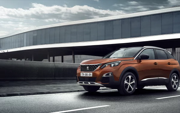HD wallpaper featuring an orange Peugeot 3008 SUV parked by a modern building under a cloudy sky, showcasing the vehicle's sleek design and bold presence.