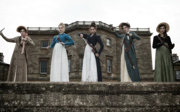 5K Ultra HD PC desktop wallpaper — movie still from Pride and Prejudice and Zombies: five Regency women in period dresses and hats, armed and posed on a stone terrace before a manor.